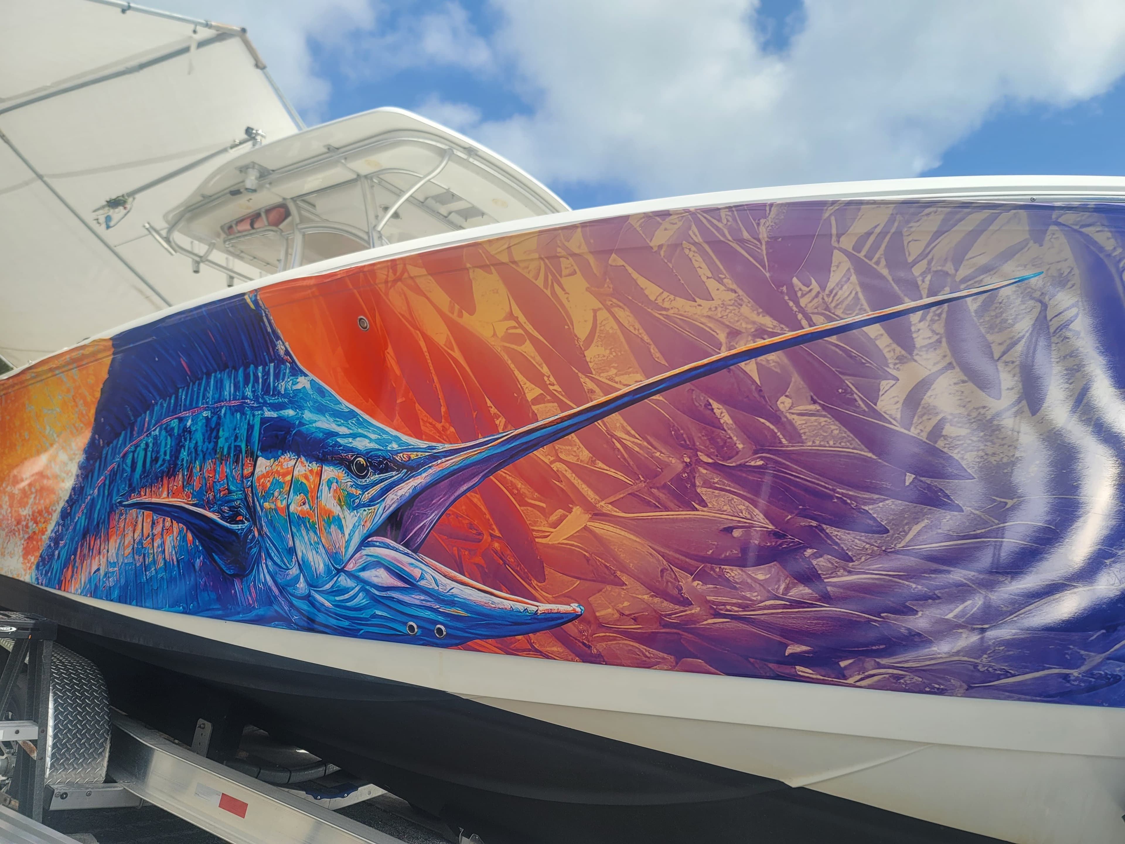 Wrapped Coastal Boat Wraps vessel on a trailer
